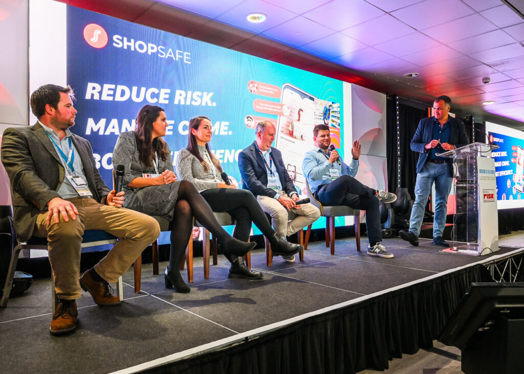 Panel of speakers on stage at Retail Risk conference event, Leicester