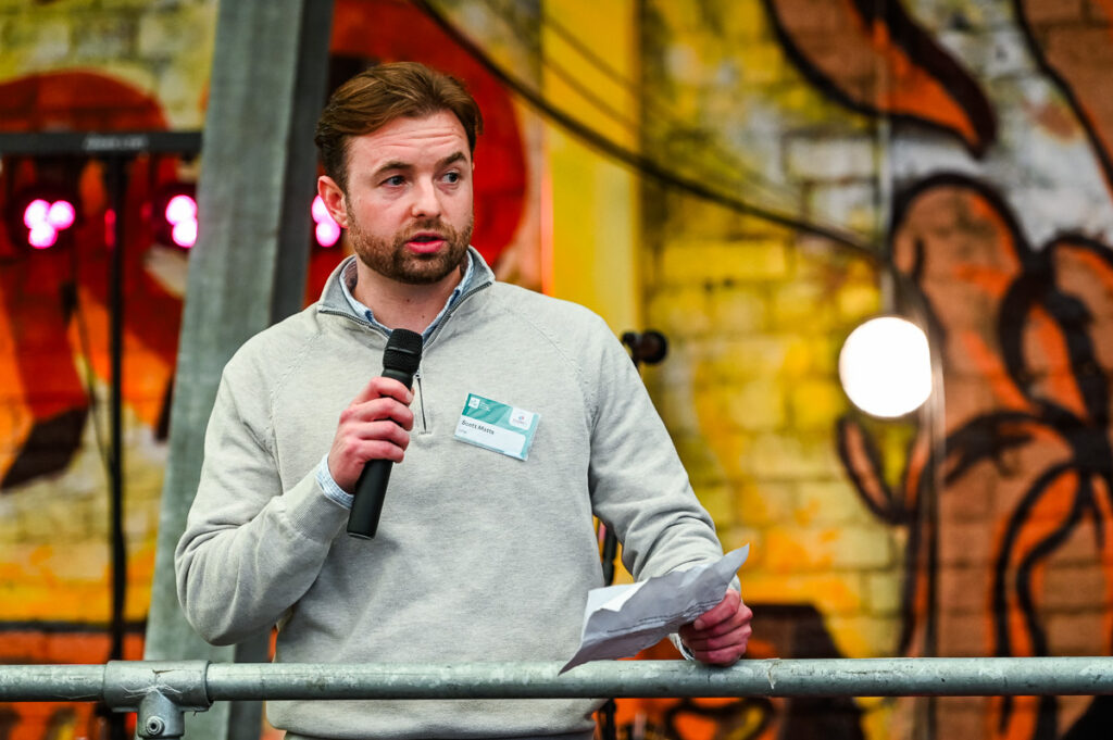Man with microphone speaking
