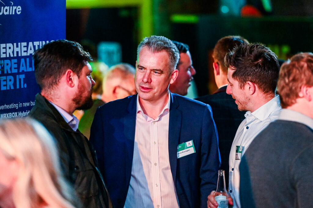 Men talking at business networking event